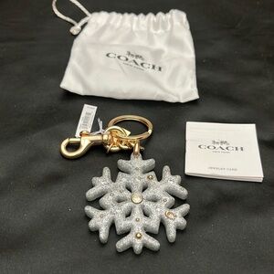 Coach Silver and Gold Snowflake Keychain limited edition vintage